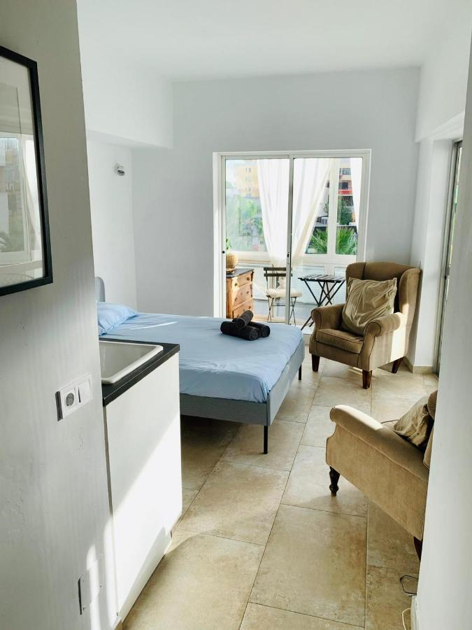 Begonia City Center Apartment 230 By Namaste Elite ตอร์เรโมลิโนส ภายนอก รูปภาพ